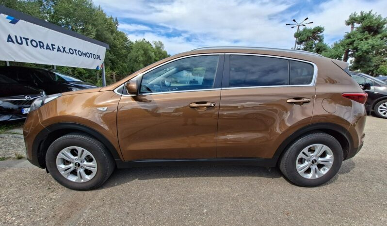 Kia Sportage | FWD (przód) | Manualna | 132 KM | Brązowy full