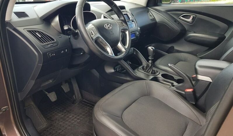 Hyundai ix35 | FWD (przód) | Manualna | 116 KM | Brązowy full