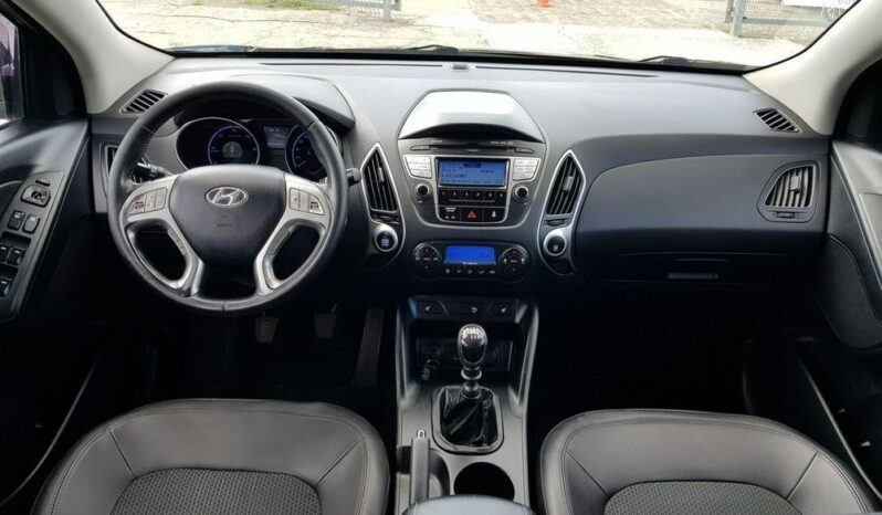 Hyundai ix35 | FWD (przód) | Manualna | 116 KM | Brązowy full