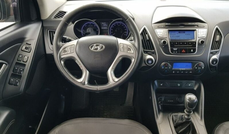 Hyundai ix35 | FWD (przód) | Manualna | 116 KM | Brązowy full