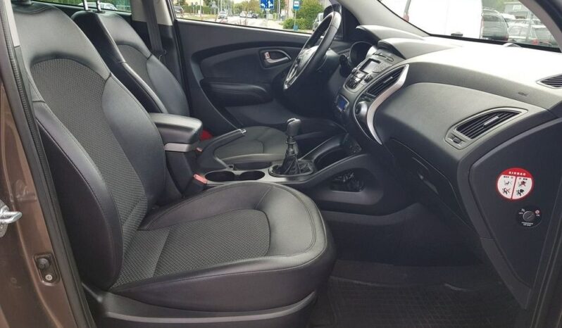 Hyundai ix35 | FWD (przód) | Manualna | 116 KM | Brązowy full