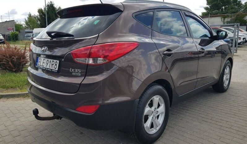 Hyundai ix35 | FWD (przód) | Manualna | 116 KM | Brązowy full