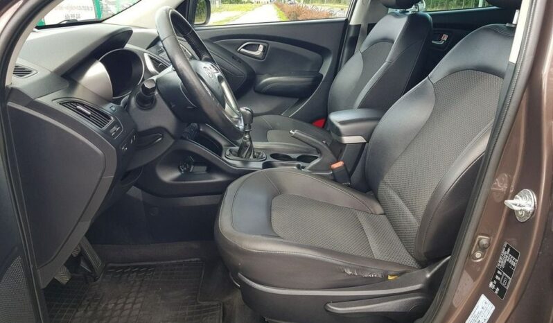 Hyundai ix35 | FWD (przód) | Manualna | 116 KM | Brązowy full