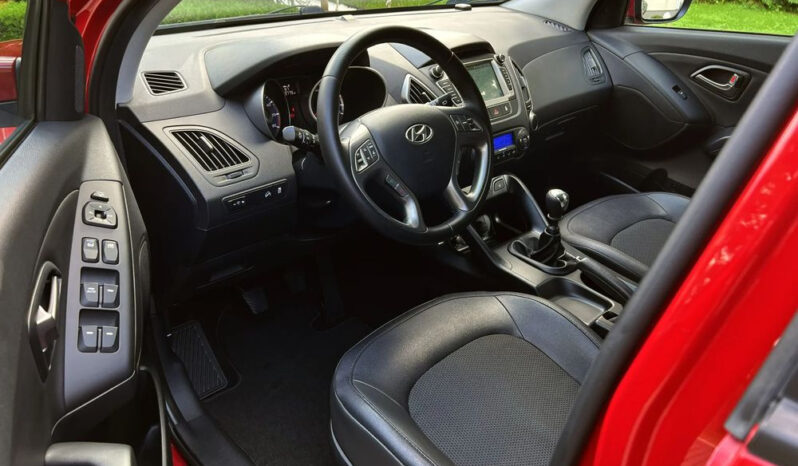 Hyundai ix35 | FWD (przód) | Manualna | 135 KM | Czerwony full