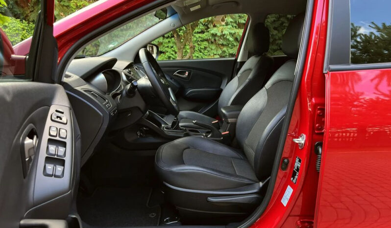 Hyundai ix35 | FWD (przód) | Manualna | 135 KM | Czerwony full
