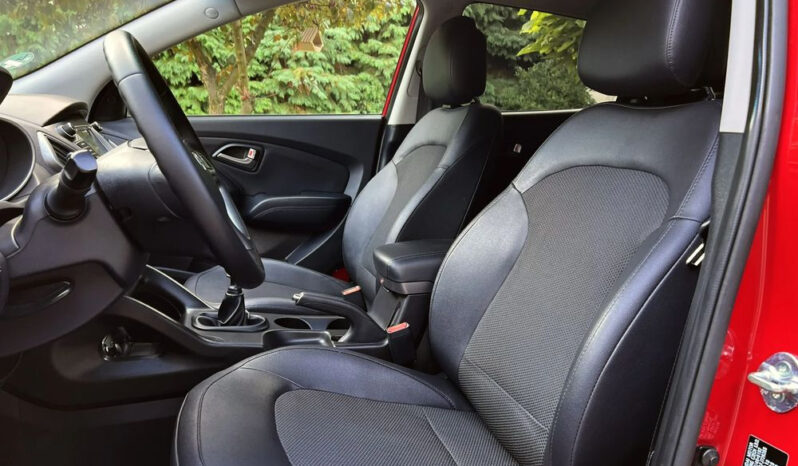 Hyundai ix35 | FWD (przód) | Manualna | 135 KM | Czerwony full