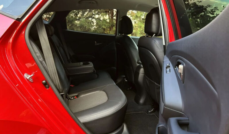 Hyundai ix35 | FWD (przód) | Manualna | 135 KM | Czerwony full