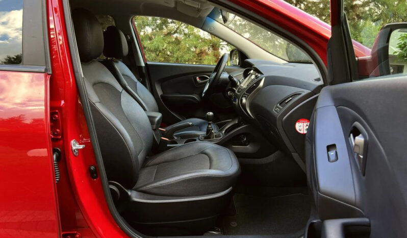 Hyundai ix35 | FWD (przód) | Manualna | 135 KM | Czerwony full