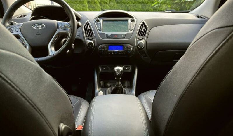 Hyundai ix35 | FWD (przód) | Manualna | 135 KM | Czerwony full
