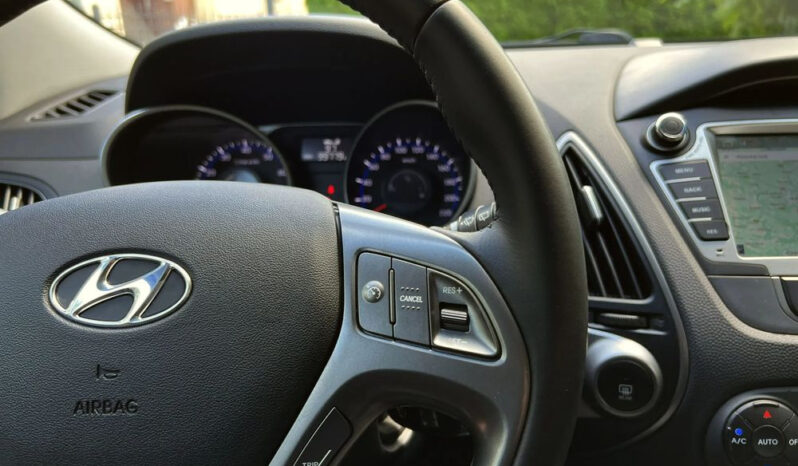 Hyundai ix35 | FWD (przód) | Manualna | 135 KM | Czerwony full