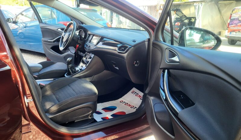 Opel Astra | FWD (przód) | Manualna | 125 KM | Brązowy full