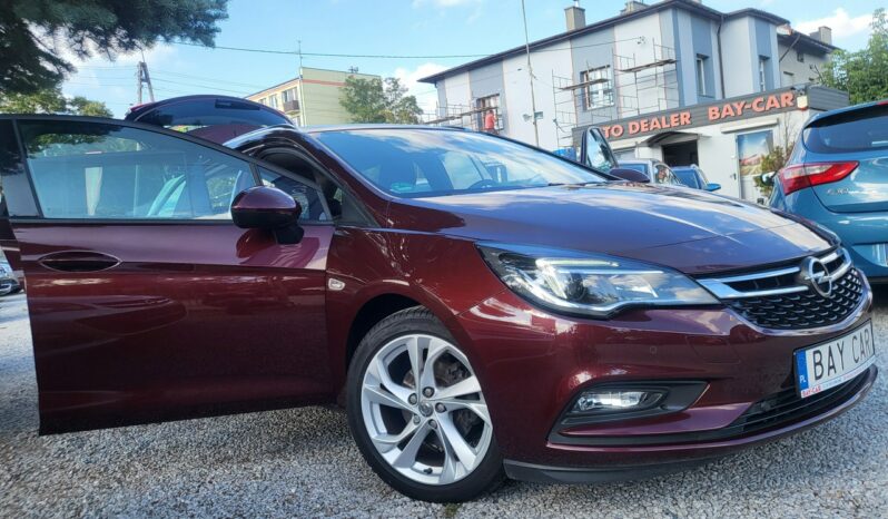 Opel Astra | FWD (przód) | Manualna | 125 KM | Brązowy full