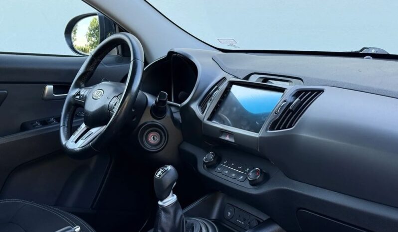Kia Sportage | FWD (przód) | Manualna | 115 KM | Czarny full